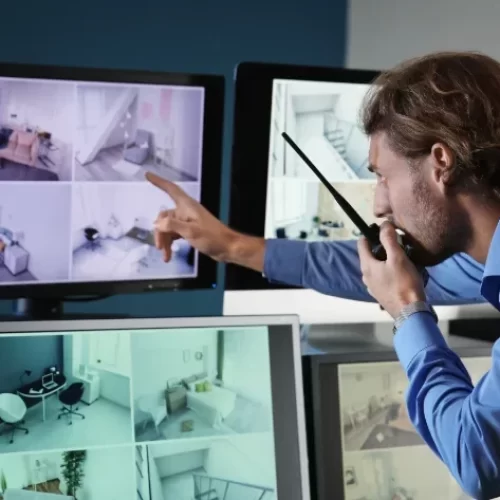 security-guard-monitoring-modern-cctv-cameras-surveillance-room